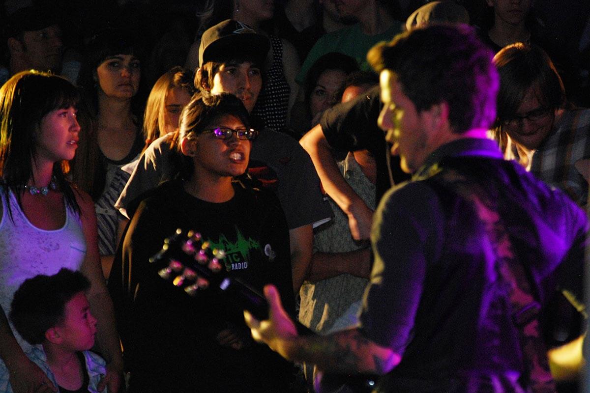audience watching a band play